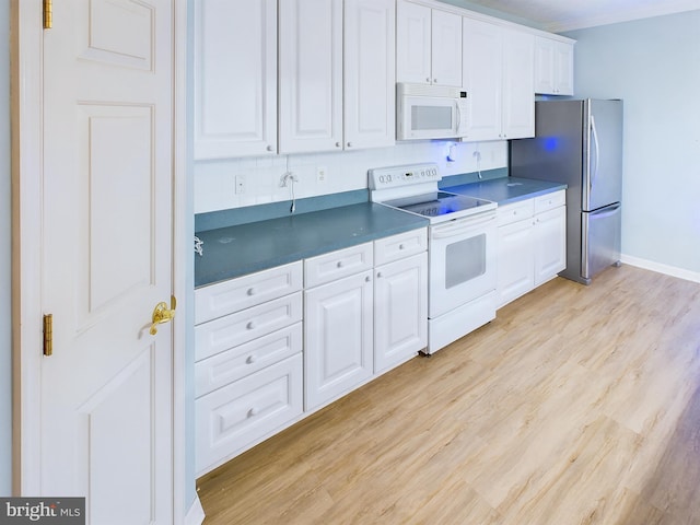 kitchen featuring white cabinets, white appliances, and light wood-type flooring