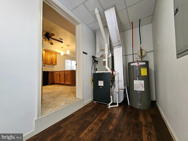 utility room with water heater