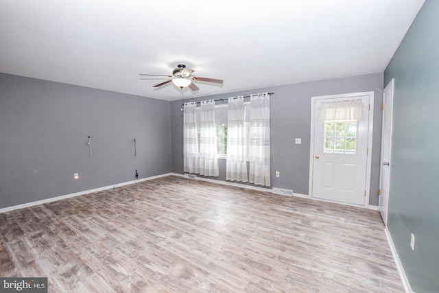 interior space featuring light hardwood / wood-style flooring and ceiling fan