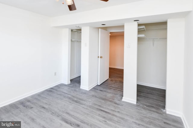 unfurnished bedroom with hardwood / wood-style flooring and ceiling fan