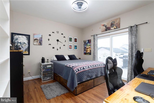 bedroom featuring wood-type flooring