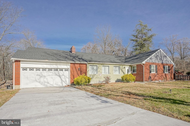 ranch-style house featuring a front lawn and a garage