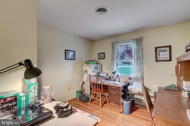 office area with light hardwood / wood-style flooring