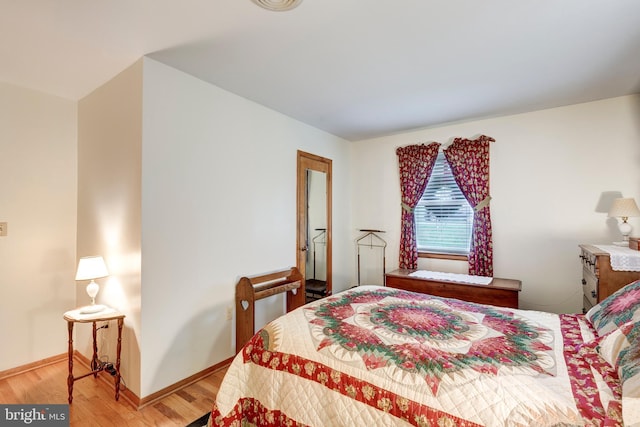 bedroom featuring hardwood / wood-style flooring