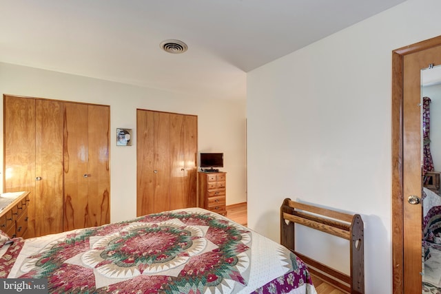 bedroom featuring hardwood / wood-style flooring