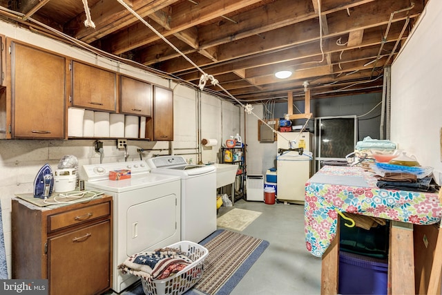 basement featuring washing machine and dryer