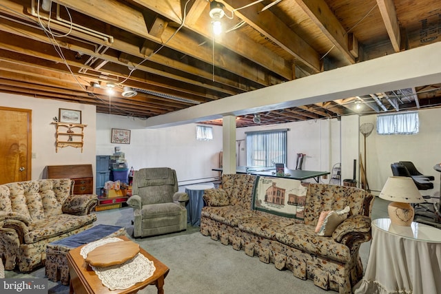 living room featuring carpet and a healthy amount of sunlight