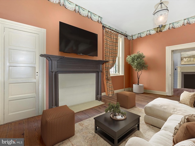 living room with hardwood / wood-style floors