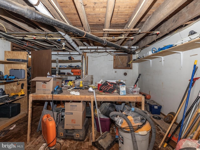 basement with a workshop area