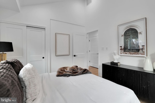bedroom with light hardwood / wood-style flooring