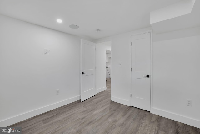 unfurnished room featuring light hardwood / wood-style floors