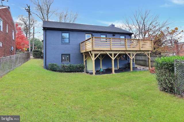 44 Sheridan St NE, Washington, DC 20011 - rear view of house featuring a wooden deck, brick siding, and a shingled roof