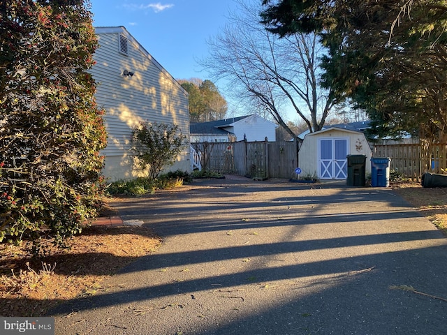 exterior space featuring a shed