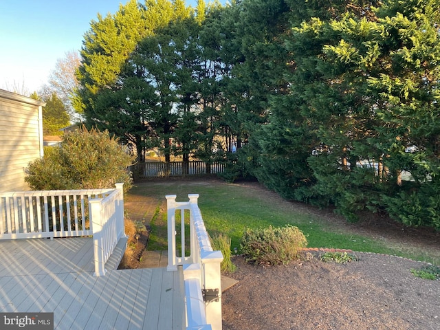 view of yard with a wooden deck