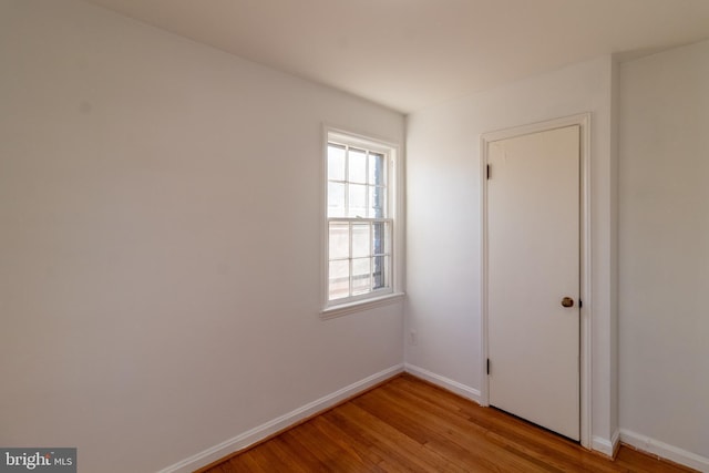 unfurnished room with light hardwood / wood-style floors