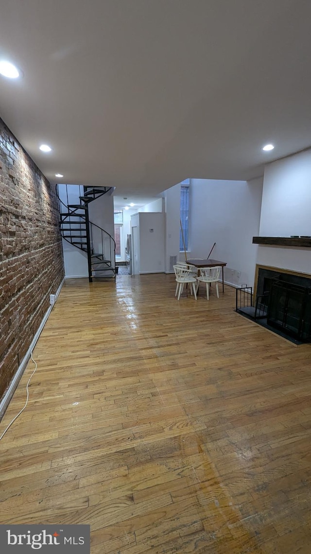 basement with light wood-type flooring