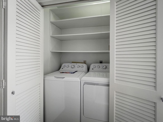 laundry area featuring independent washer and dryer