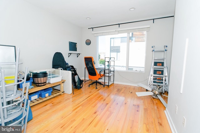 misc room with wood-type flooring