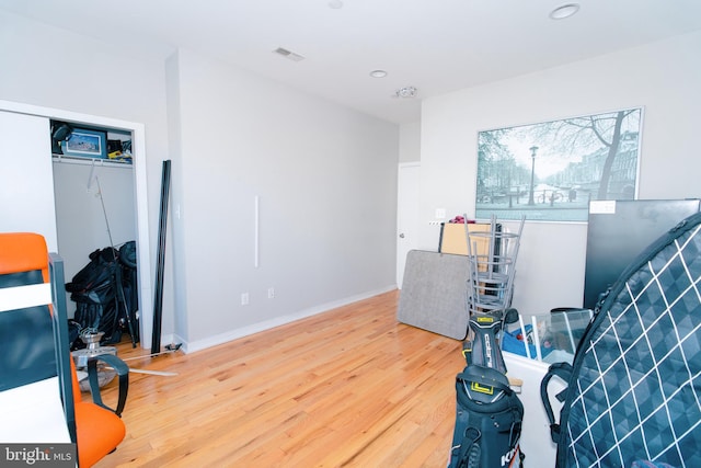 office area with hardwood / wood-style floors