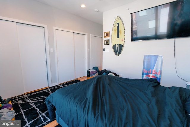 bedroom with multiple closets