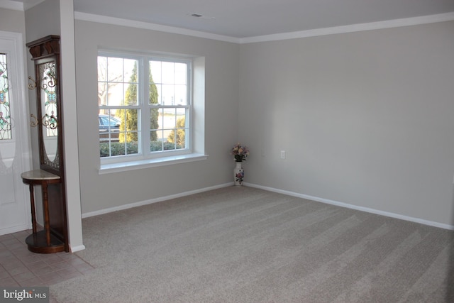 carpeted empty room with ornamental molding