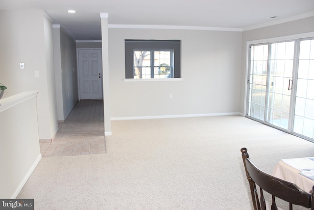 carpeted spare room with ornamental molding