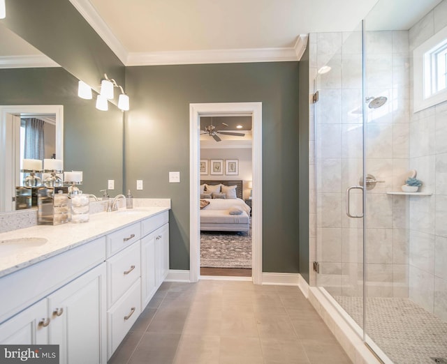 bathroom featuring tile patterned flooring, vanity, and ornamental molding