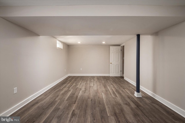 basement featuring dark hardwood / wood-style floors