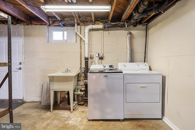 laundry area featuring washing machine and dryer