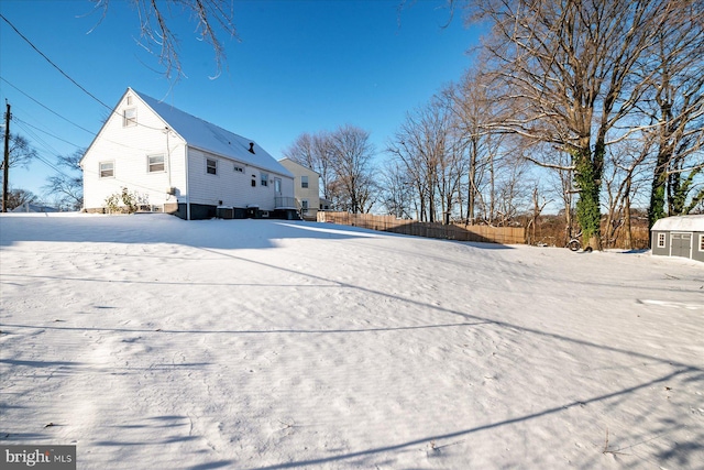 view of yard covered in snow