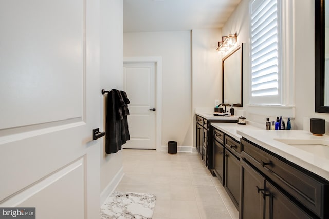 bathroom featuring tile patterned floors and vanity