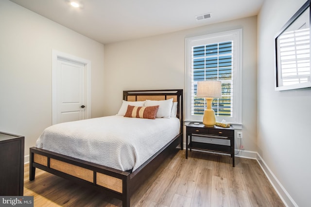 bedroom featuring hardwood / wood-style flooring