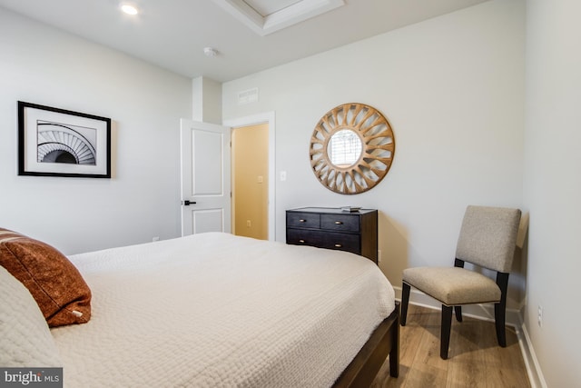 bedroom with light hardwood / wood-style flooring