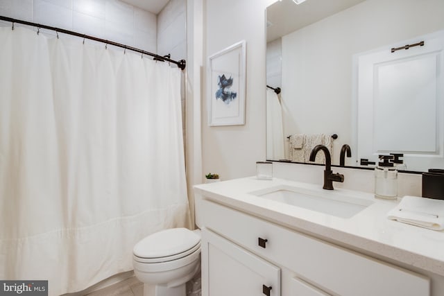 bathroom with hardwood / wood-style flooring, vanity, toilet, and a shower with curtain