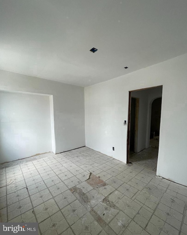 5716 Commerce St, Philadelphia, PA 19139 - unfurnished room with arched walkways and light flooring