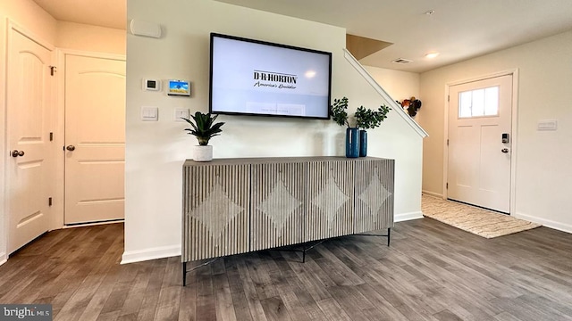 foyer entrance featuring wood-type flooring