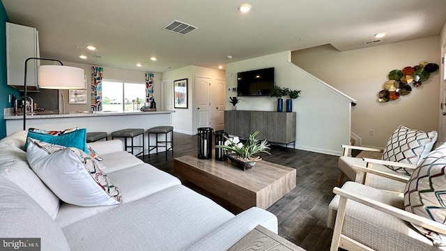 living room with dark wood-type flooring