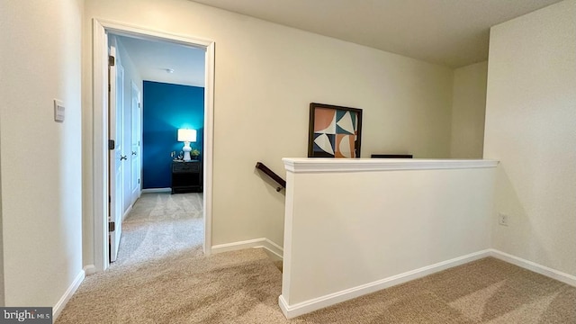 hallway with carpet