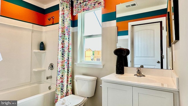 full bathroom featuring vanity, toilet, and shower / bathtub combination with curtain