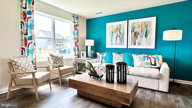 sitting room featuring hardwood / wood-style floors