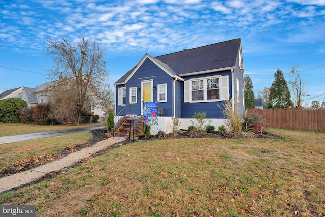 view of front of property with a front lawn