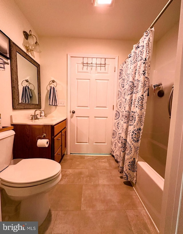 full bathroom featuring shower / tub combo, vanity, and toilet