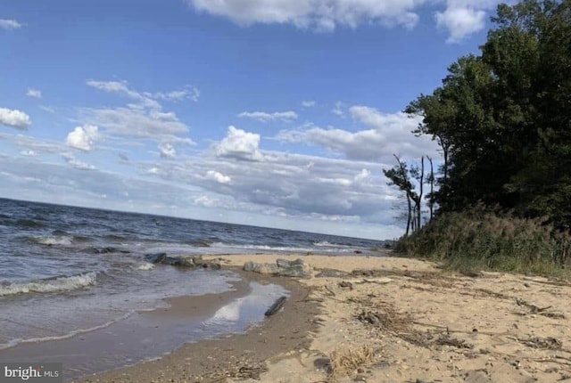 view of water feature featuring a beach view