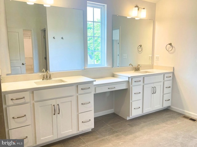 623 Plainview Dr, Fredericksburg, VA 22405 - full bathroom featuring baseboards and two vanities