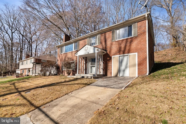 view of front of property with a front lawn