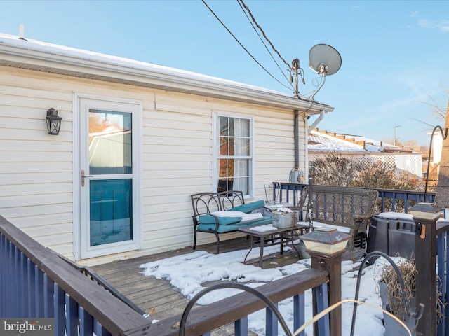 view of snow covered deck