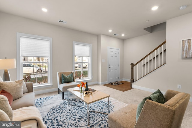 living room with light colored carpet