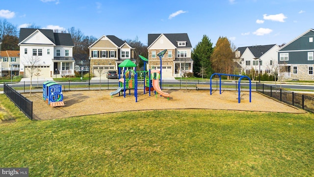 view of jungle gym with a lawn