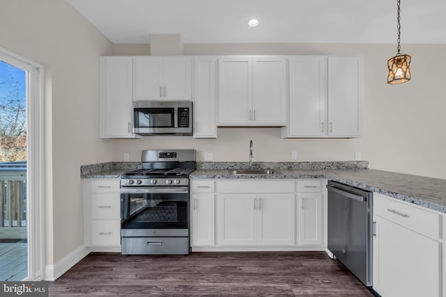 14 Mill Creek Ct, Bayville, NJ 08721 - kitchen featuring appliances with stainless steel finishes, a sink, white cabinets, light stone counters, and recessed lighting