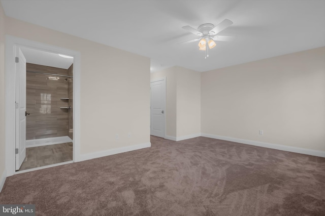 unfurnished bedroom featuring carpet flooring, ensuite bathroom, and ceiling fan